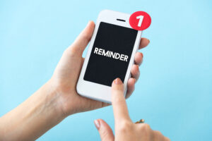Picture showing the reminder on phone representing the reminder alerts to customer